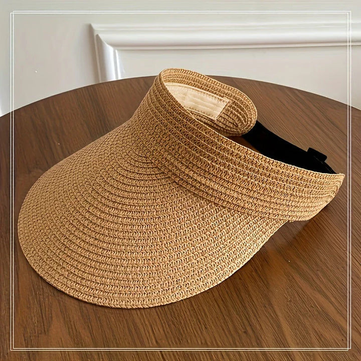 Women's fashion new foldable sun visor, wide-brim design with adjustable strap for outdoor use.
