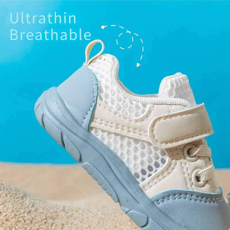 Newborn baby wearing flexible barefoot shoes, promoting natural foot development and comfortable first walks.