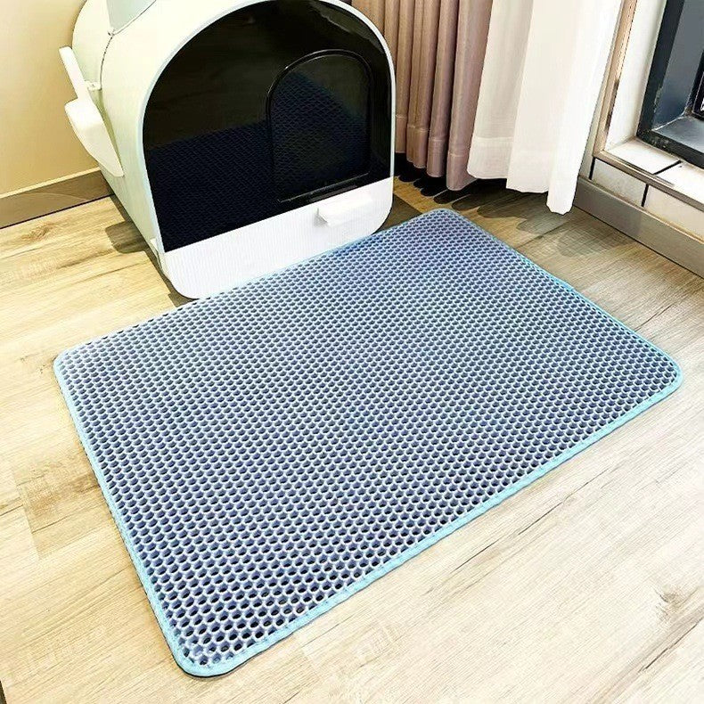 Easy-clean cat litter mat with deep grooves to trap scatter, ensuring clean paws & a mess-free living space.
