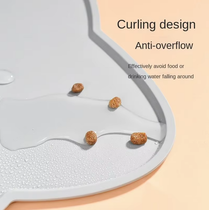 Flexible silicone non-slip cat bowl mat ensures dishes stay put, easy to wipe clean.