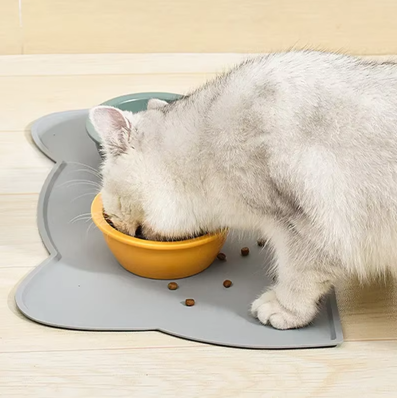 Practical non-slip pet food mat for cats, silicone material, easy-clean base for spills.