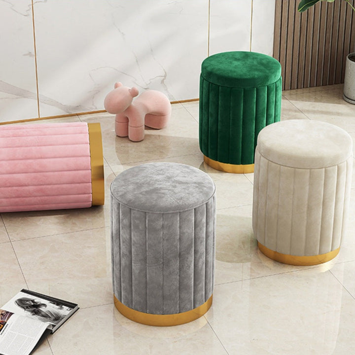 Modern round storage ottoman with mirror finish. Nordic Chic design for any living space.