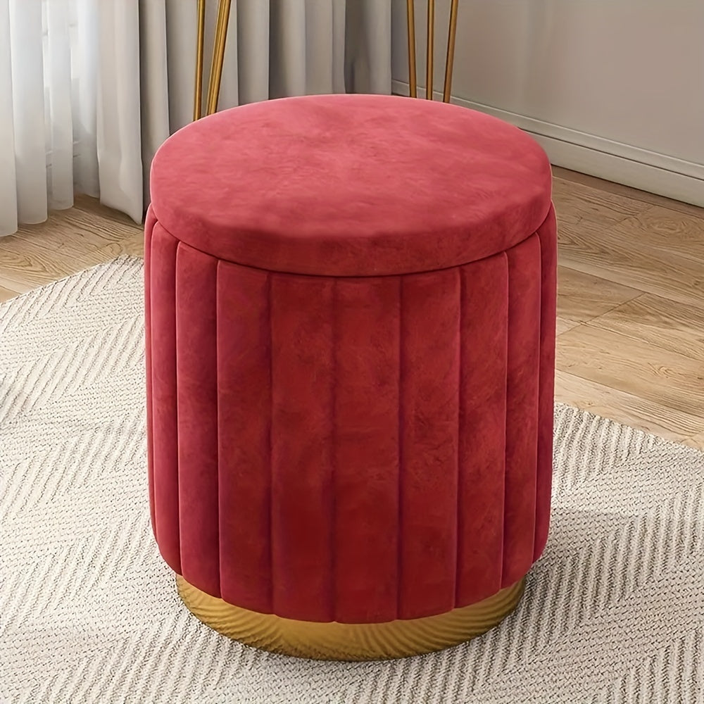 Fabric round storage ottoman. Chic accent piece with mirror detail, ideal for bedrooms.