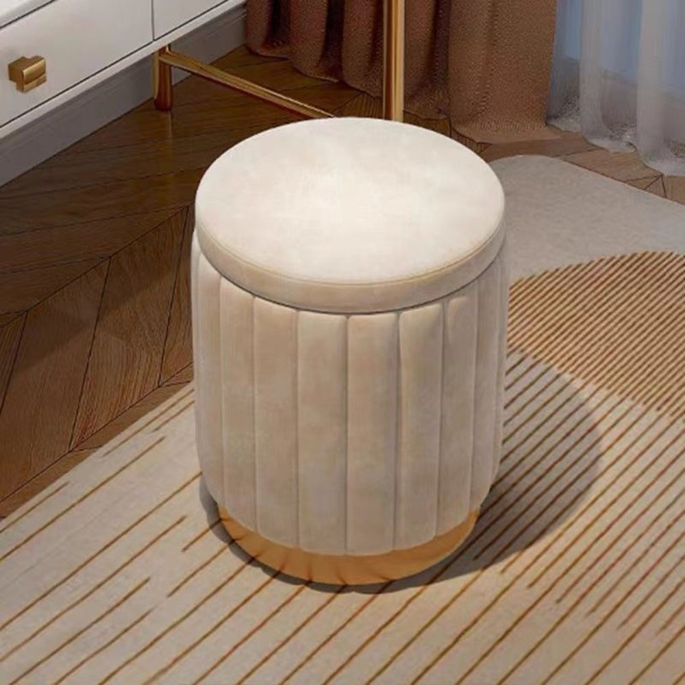 Elegant round storage ottoman. Mirror finish & fabric texture for a modern living room.