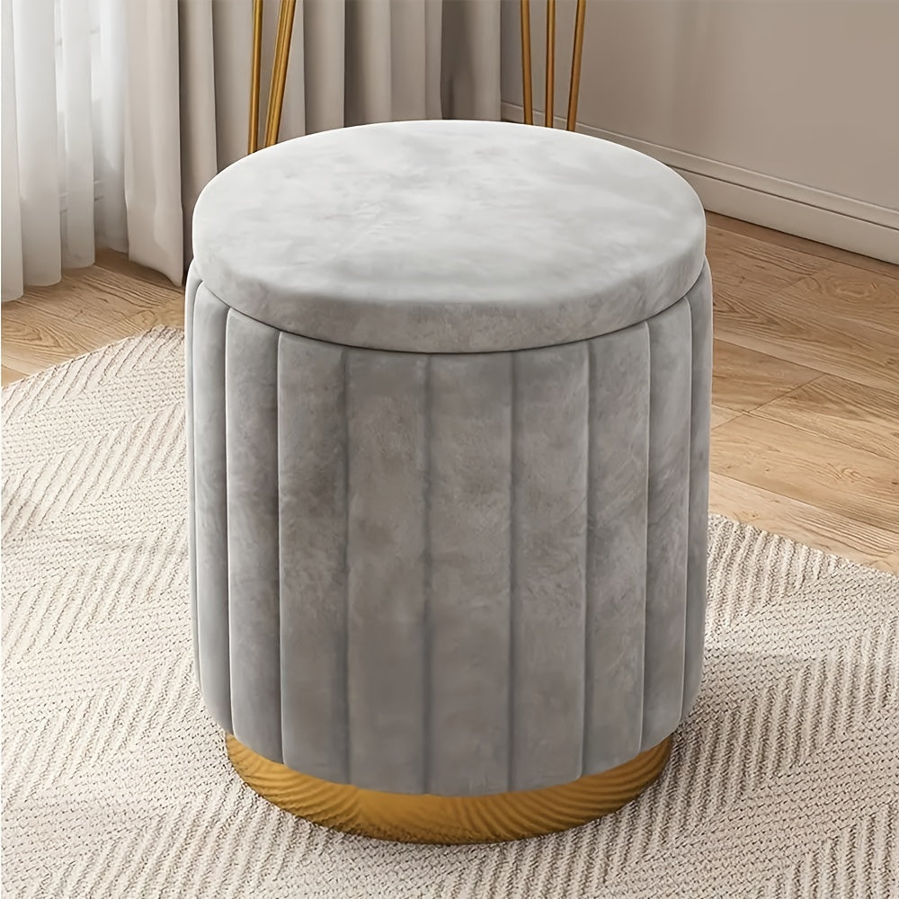 Fabric storage pouf with a chic mirror finish. Round ottoman for living room or bedroom.