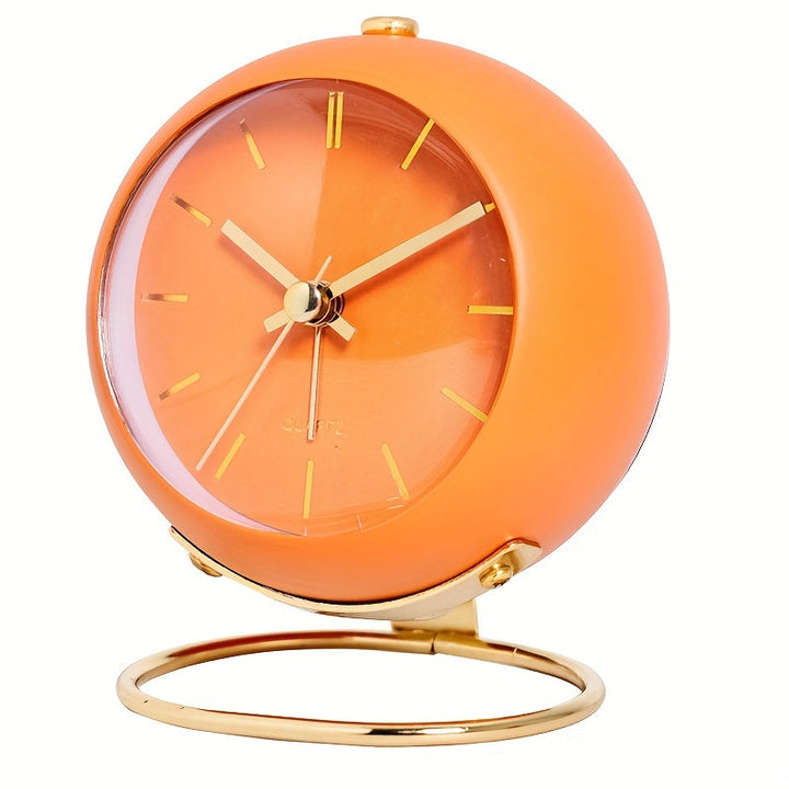 Minimalist silent desk clock with a polished metal frame and bright, luminous hands for visibility.