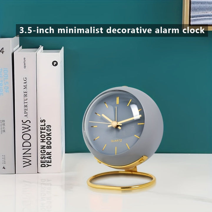 Stylish unisex silent desk clock with a polished metal frame and glowing hands for easy night viewing.
