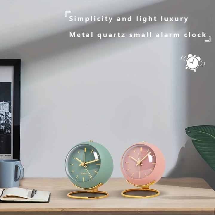 Battery-operated silent desk clock. Features a metal frame & luminous hands. Great for office or home.