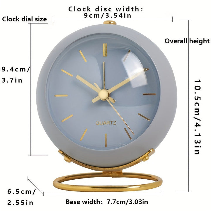 Sleek metal frame silent desk clock with luminous hands. A perfect minimalist timepiece for your desk.