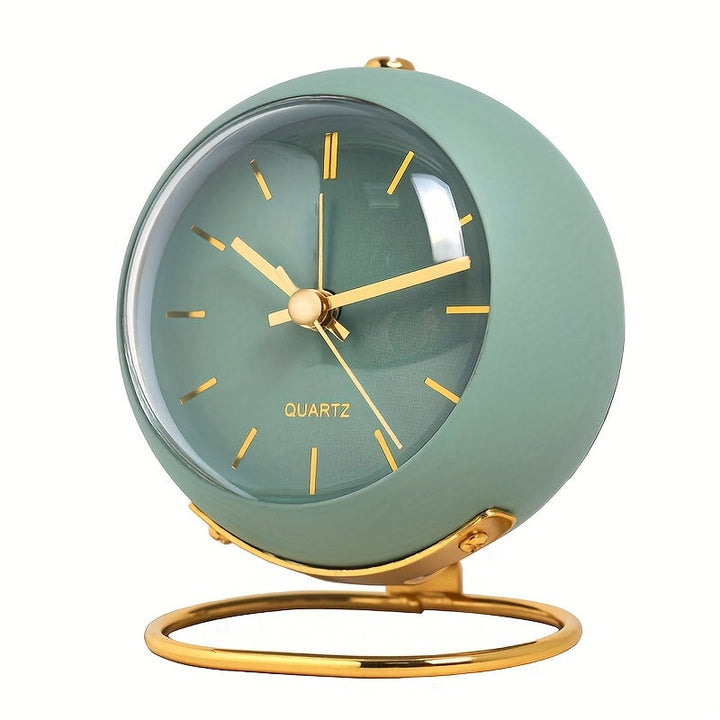 Luminous hands silent desk clock with a chic metal frame. A modern Nordic accent for any bedside.
