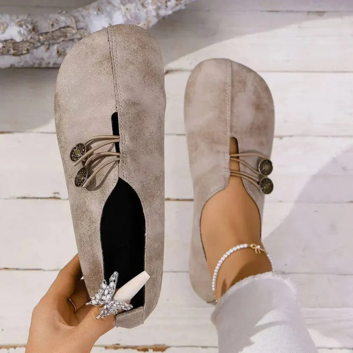 Supportive women's orthopedic shoes in a neutral color, perfect for all-day comfort and casual style.