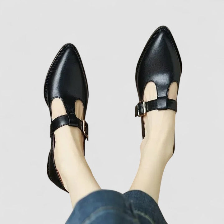 Casual women's orthopedic flats, Mary Jane style with a buckle strap, pointed toe, and durable leather upper.