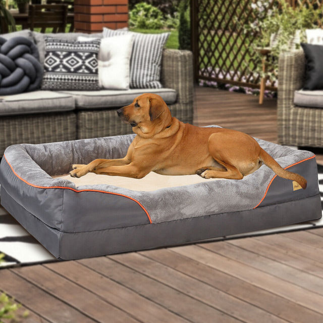 Large dog bed with high-density memory foam, providing orthopedic relief for senior pets.