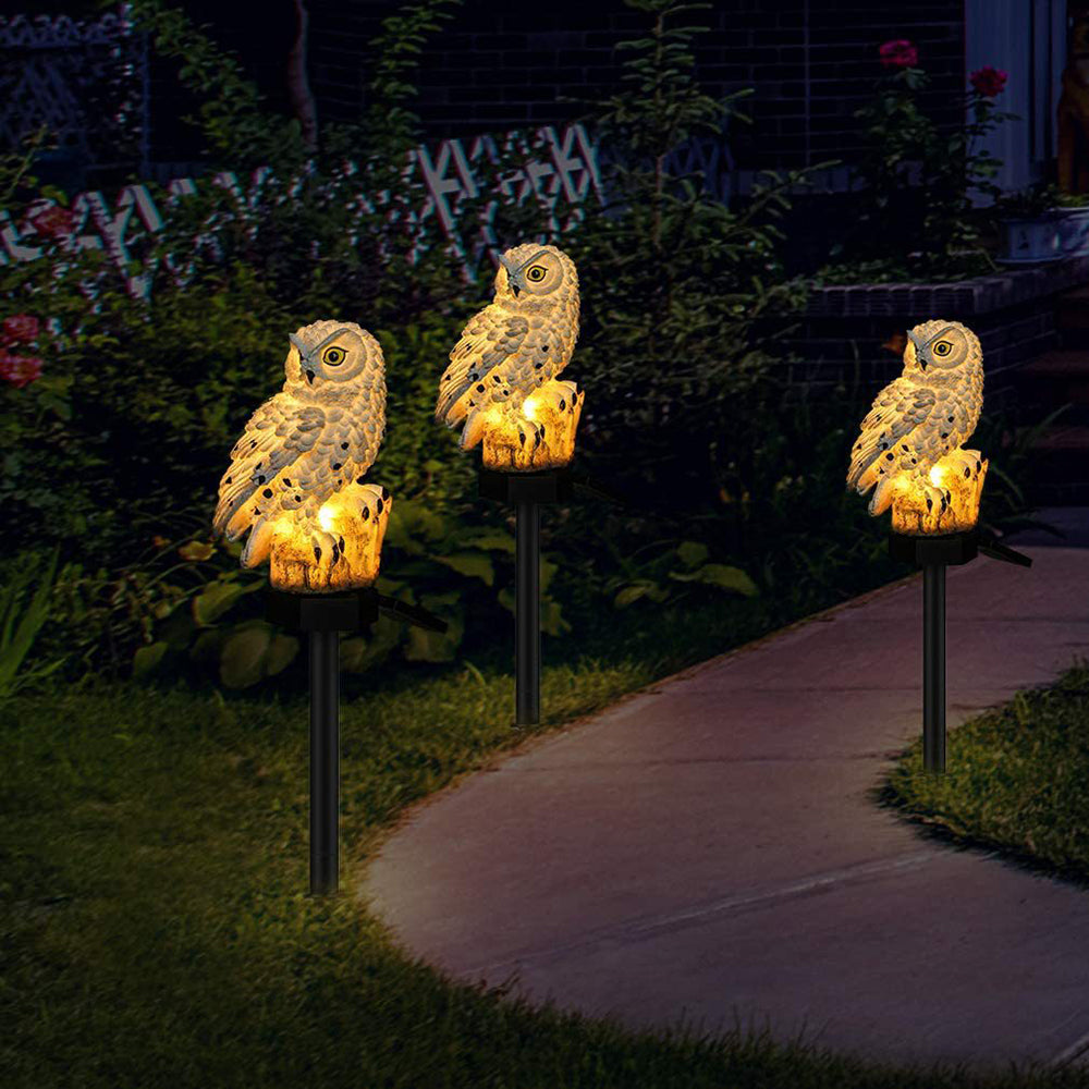 "Outdoor solar owl lamp set with LED lights, intricate details, eco-friendly lighting, ideal for gardens and patios."