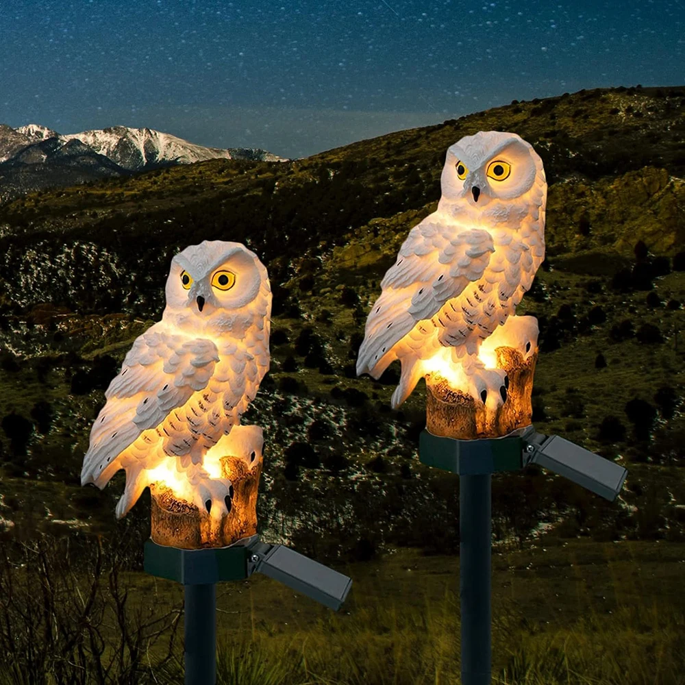 "Outdoor solar owl lamp set with LED lights, intricate details, eco-friendly lighting, ideal for gardens and patios."