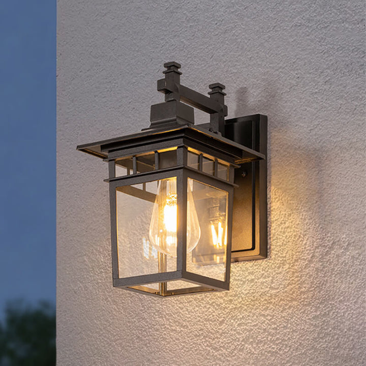 Waterproof exterior wall lamp, black copper modern rustic design for porch, patio, or garden lighting.
