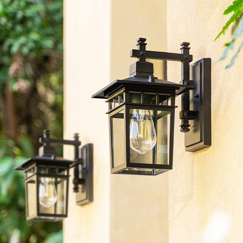 Durable outdoor wall lantern, waterproof black copper aluminum light fixture for garden and home decor.