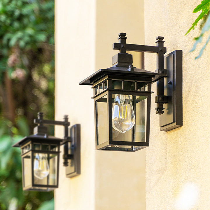 Durable outdoor wall lantern, waterproof black copper aluminum light fixture for garden and home decor.