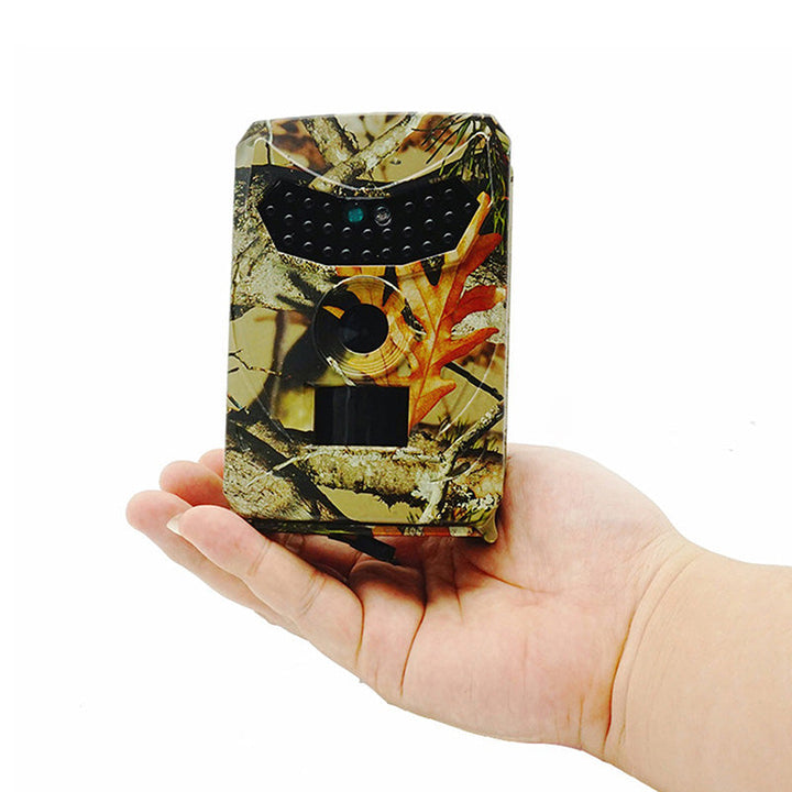 Advanced game camera for nature observation, offering HD night vision, rapid motion detect, & weather resistance.