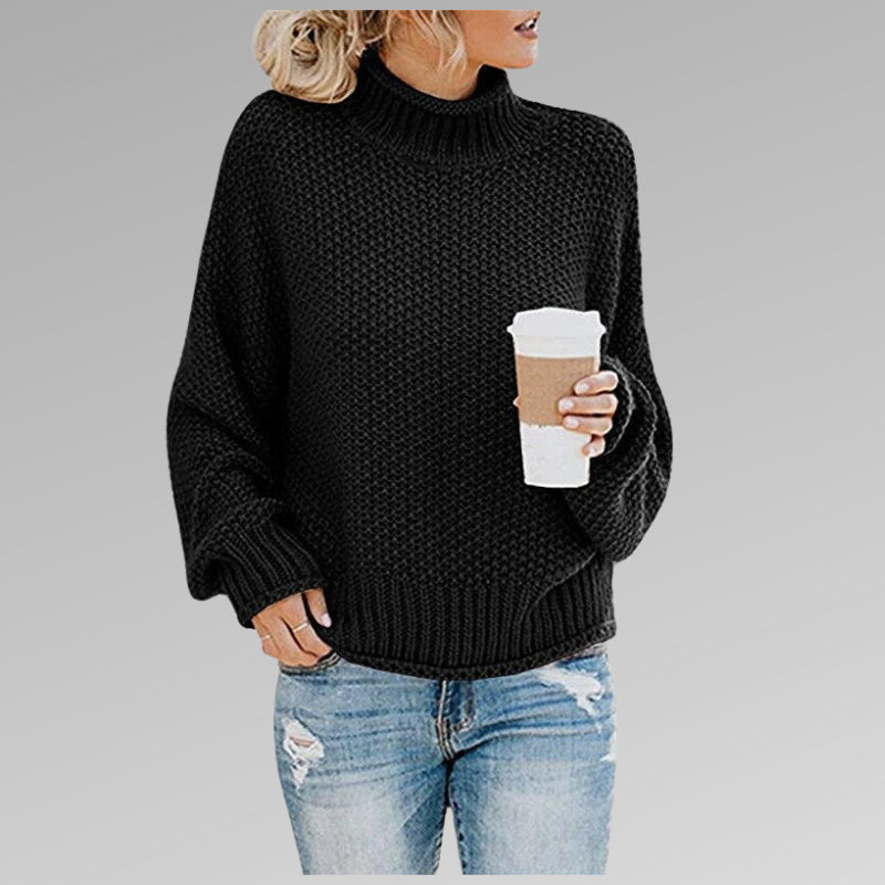 Casual women's oversized chunky knit sweater in a neutral tone, ideal for spring