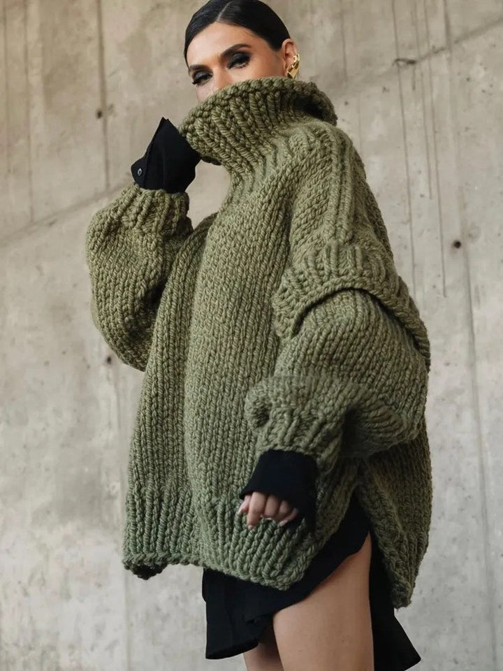 Woman wearing a chic oversized long sleeve mini dress, embodying relaxed street style.