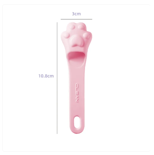 Dog paw tongue cleaner for better breath & dental health. Easy-grip pet grooming tool.