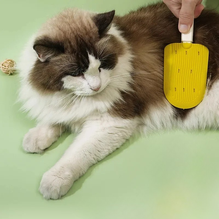 Pet deshedding grooming brush for cats & dogs. Effectively removes loose fur & reduces shedding for a healthy coat.