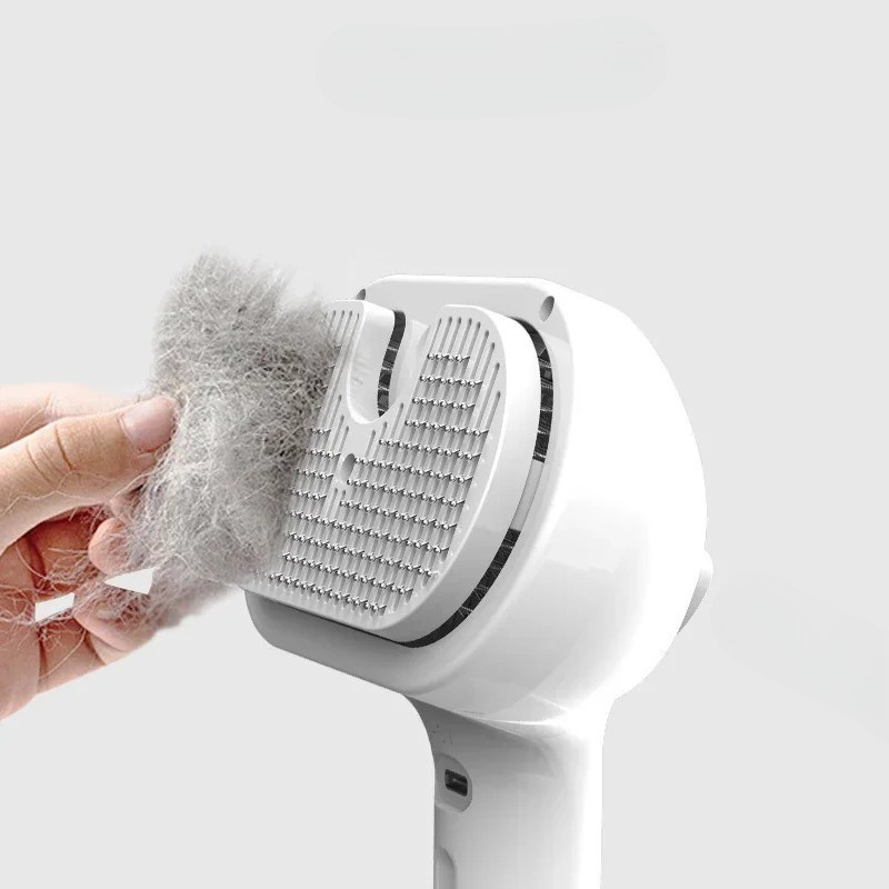 Pet Grooming Spray Brush for cats & dogs. Gently detangles fur, massages skin, reduces static. USB rechargeable.