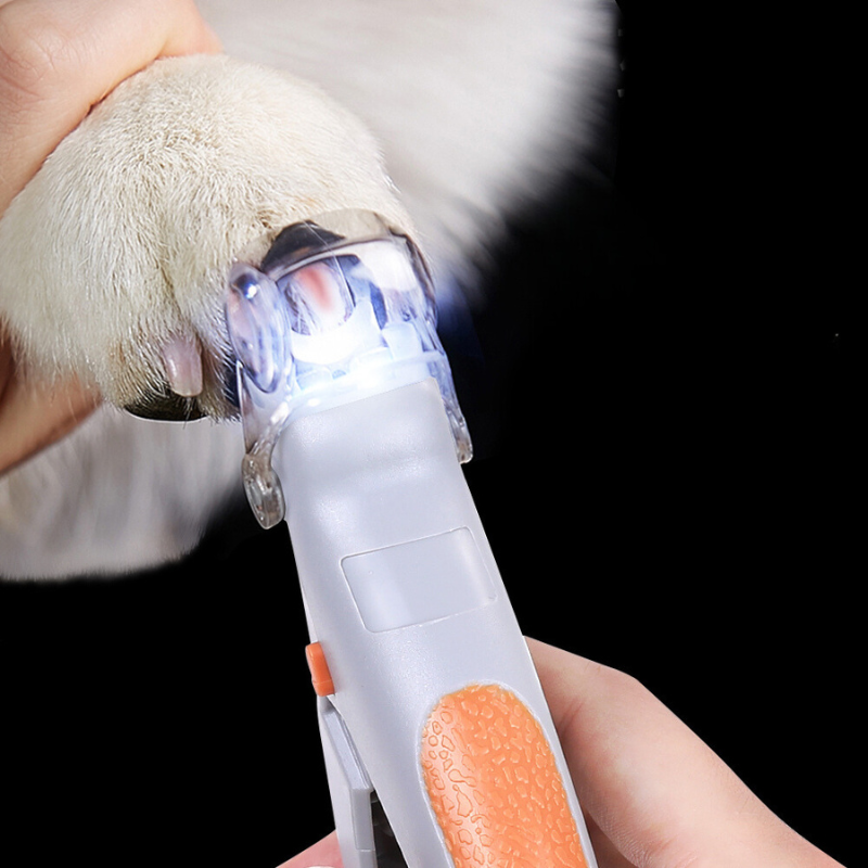 Pet nail clippers with bright LED light for safe, stress-free dog & cat nail grooming. Essential pet care tool.