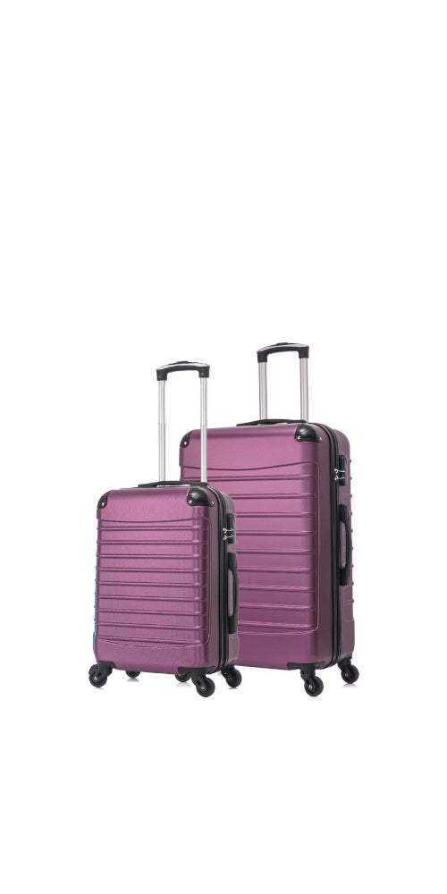 Pink 2-piece hardside spinner luggage set for stylish & durable airport travel.
