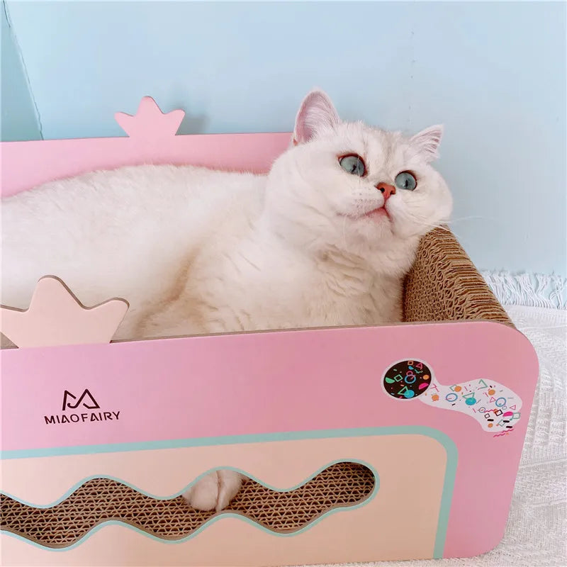 Pink multi-level cat scratching box with integrated play toys, ideal for feline claw care and entertainment.
