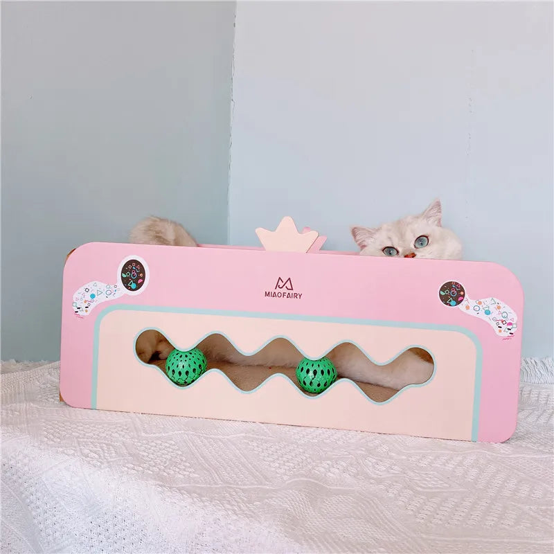 Vibrant pink multi-level cat tree & scratching post with interactive toys & a comfy cat bed for play & rest.