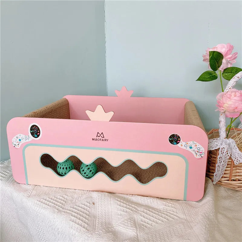 Pink multi-level cat furniture scratcher, an activity center with interactive hanging toys & a cozy bed for felines.