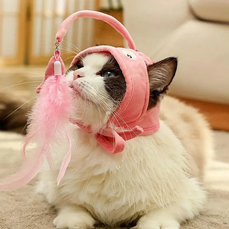 Playful cat hat with interactive feather pendant, a funny cat accessory for feline fun.