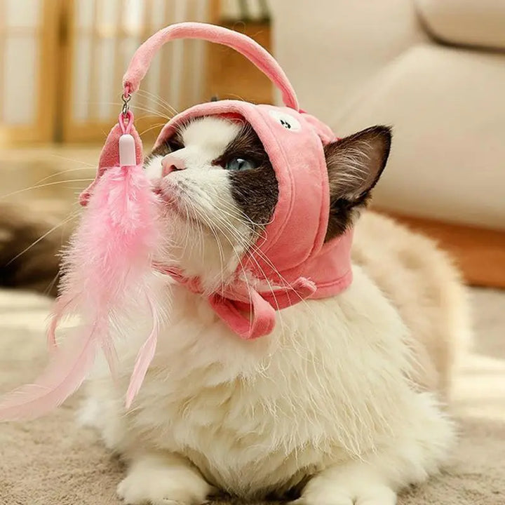 Playful cat hat with interactive feather pendant, a funny cat accessory for feline fun.