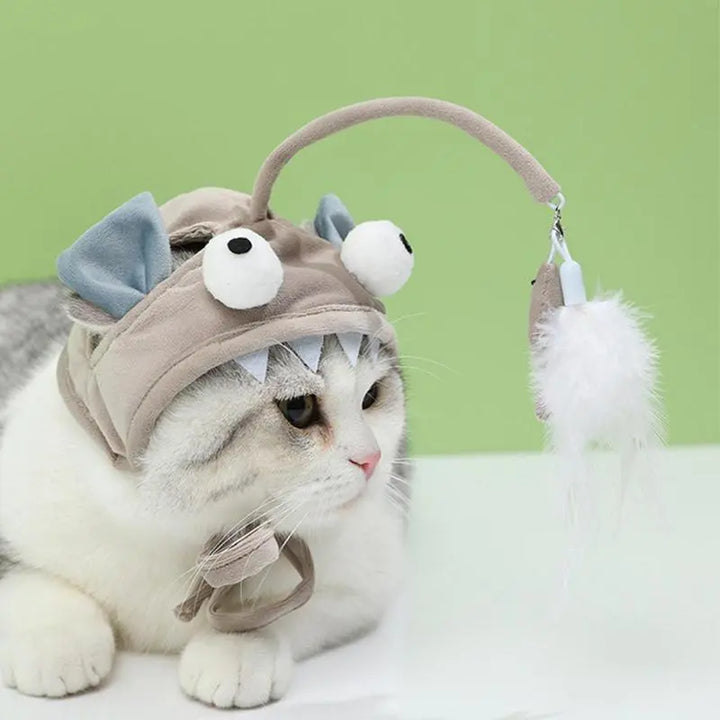 Interactive cat hat with feather toy for playful cats. Great pet costume & accessory.