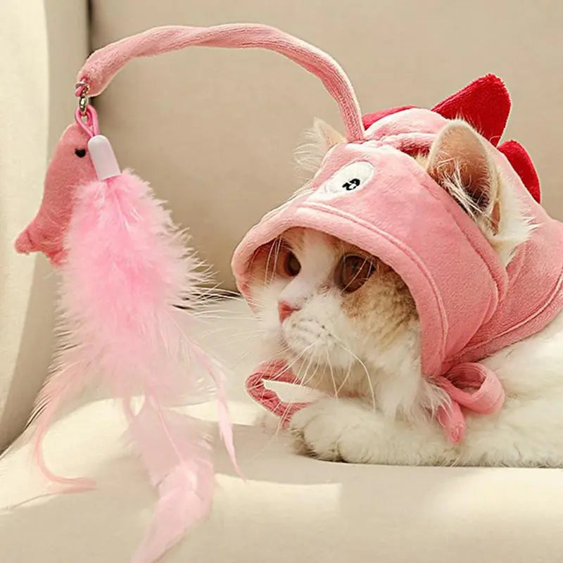 Stylish pet fashion cat hat with interactive feather pendant, a unique cat accessory.