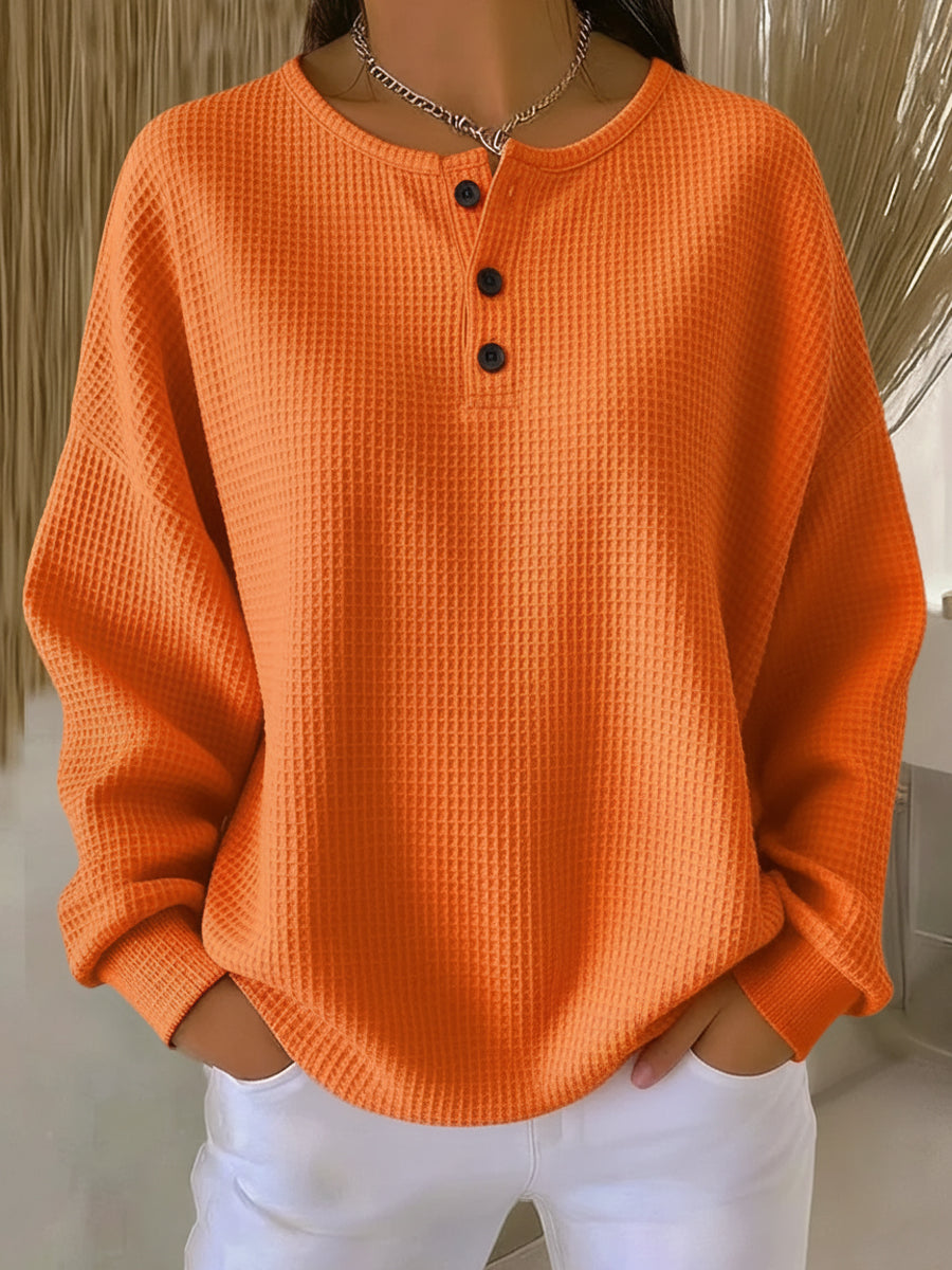 Plus size women's cozy waffle knit Henley top in a rich burgundy color, perfect for fall fashion.