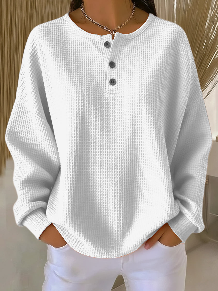 Comfortable long sleeve waffle knit Henley top for women, ideal casual wear in winter essential style.