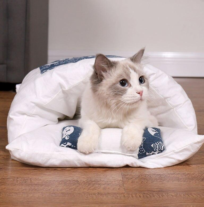 Warm cat sleeping bag for pets, a cozy hideaway & washable plush cat bed.