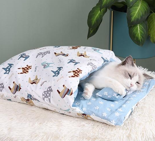 Soft plush cat bed & cozy sleeping bag, perfect pet comfort and a warm hideaway.