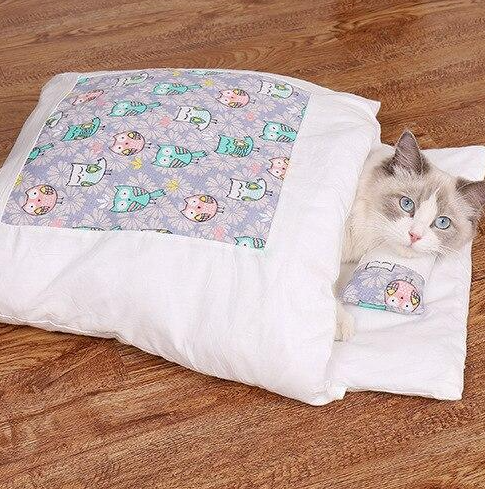 Washable plush cat bed & sleeping bag, a warm, cozy pet hideaway for feline comfort.
