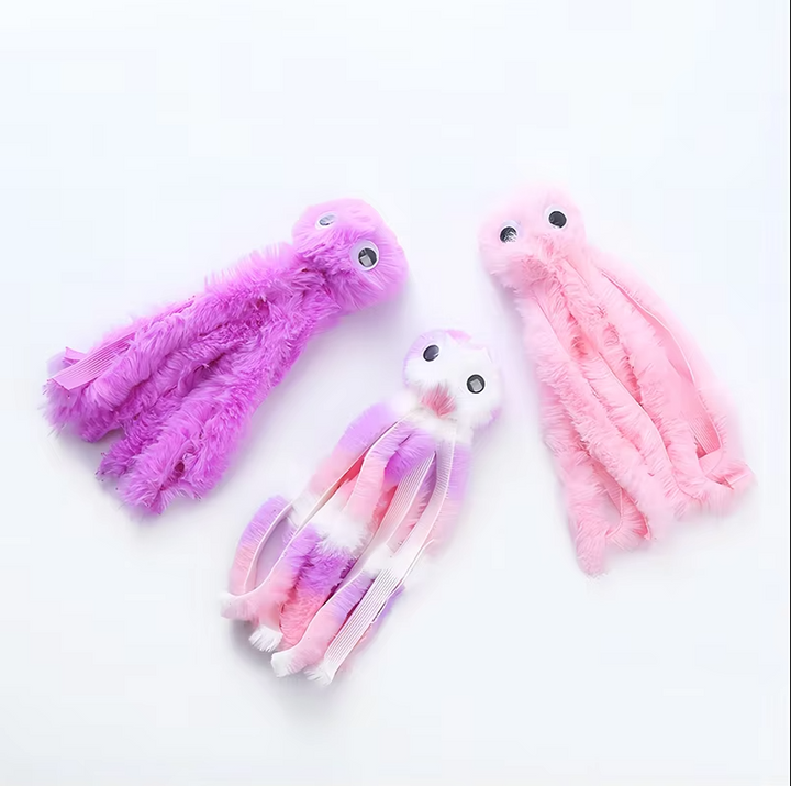 Durable soft plush octopus cat toy with wiggling tentacles and catnip, encouraging active playtime & pouncing.