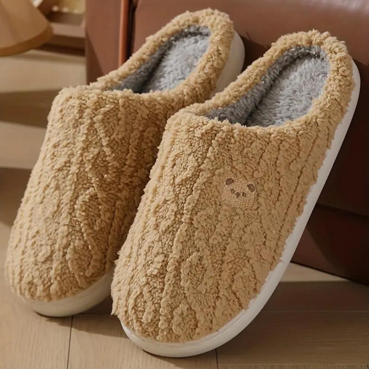 Cute women's indoor slippers in a charming spring color, offering plush warmth and soft cushioning.