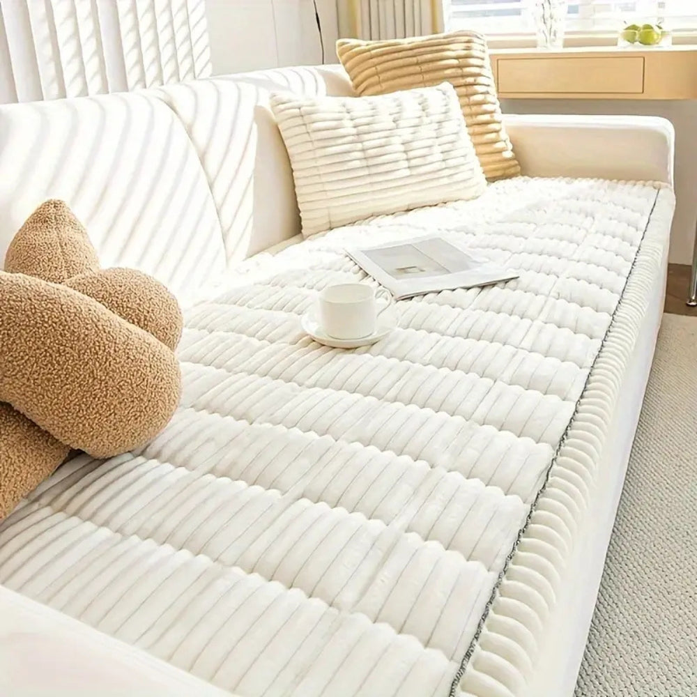 Cozy plush sofa protector mat, fleece textured, offering ultimate comfort & pet-friendly furniture defense.