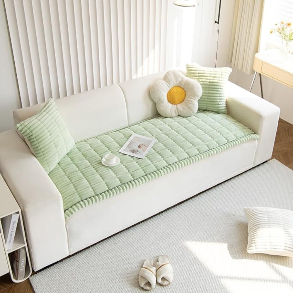 Plush sectional sofa protector mat, fleece textured, non-slip, offering cozy furniture defense for large couches.