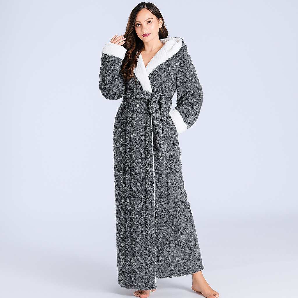 Soft long women's hooded flannel bathrobe, ideal for luxurious warmth and comfort as sleepwear.