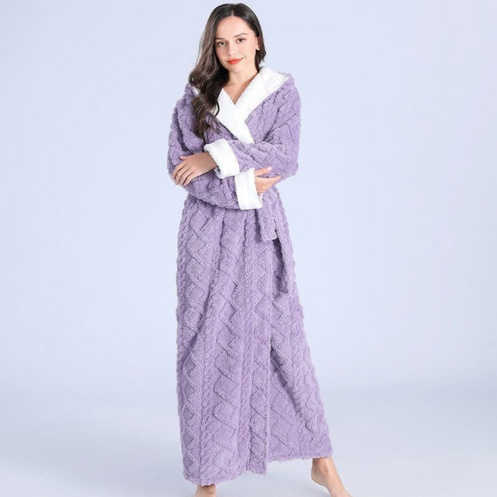 Cozy women's thick flannel hooded robe, perfect for chilly mornings and relaxing winter comfort.