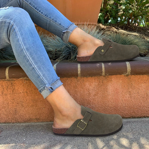 Women's plush orthopedic slippers offering arch support and supreme comfort indoors.