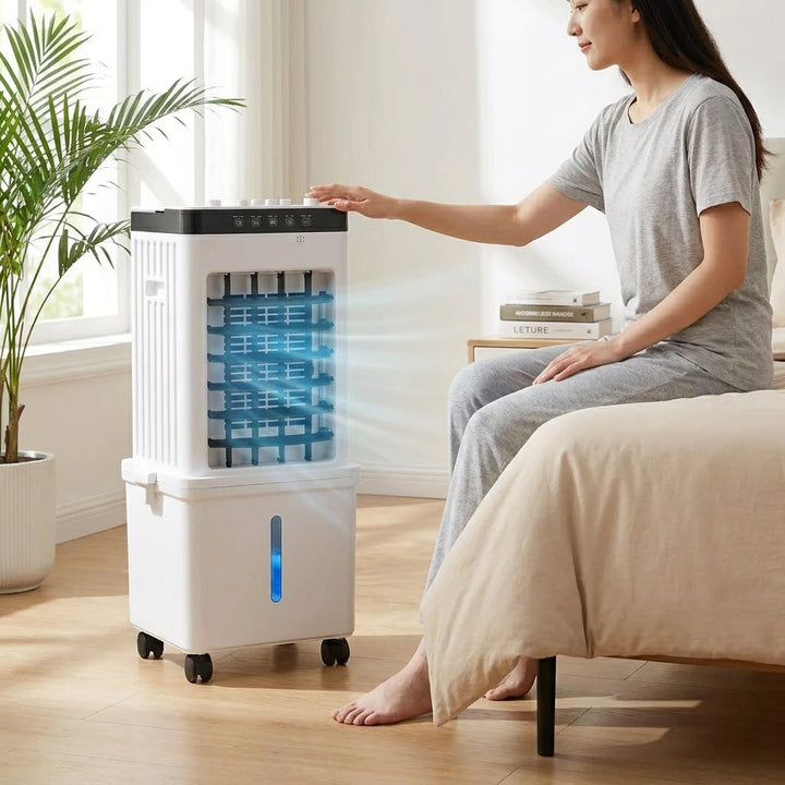 Essential 3-in-1 portable air cooler, fan, and dehumidifier. Provides quiet, energy-efficient summer home cooling.